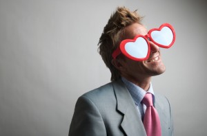 man with heart glasses