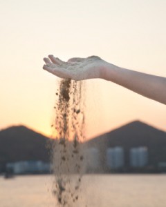 sand through hand